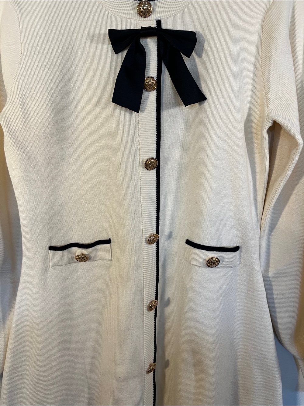 Avantlook Cream Long Sleeve Knit Dress with Black Trim and Bow Accent - Picture 2 of 5